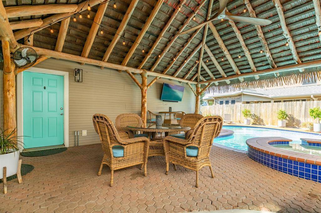 Access to the backyard & pool is conveniently located through a door from the garage area.