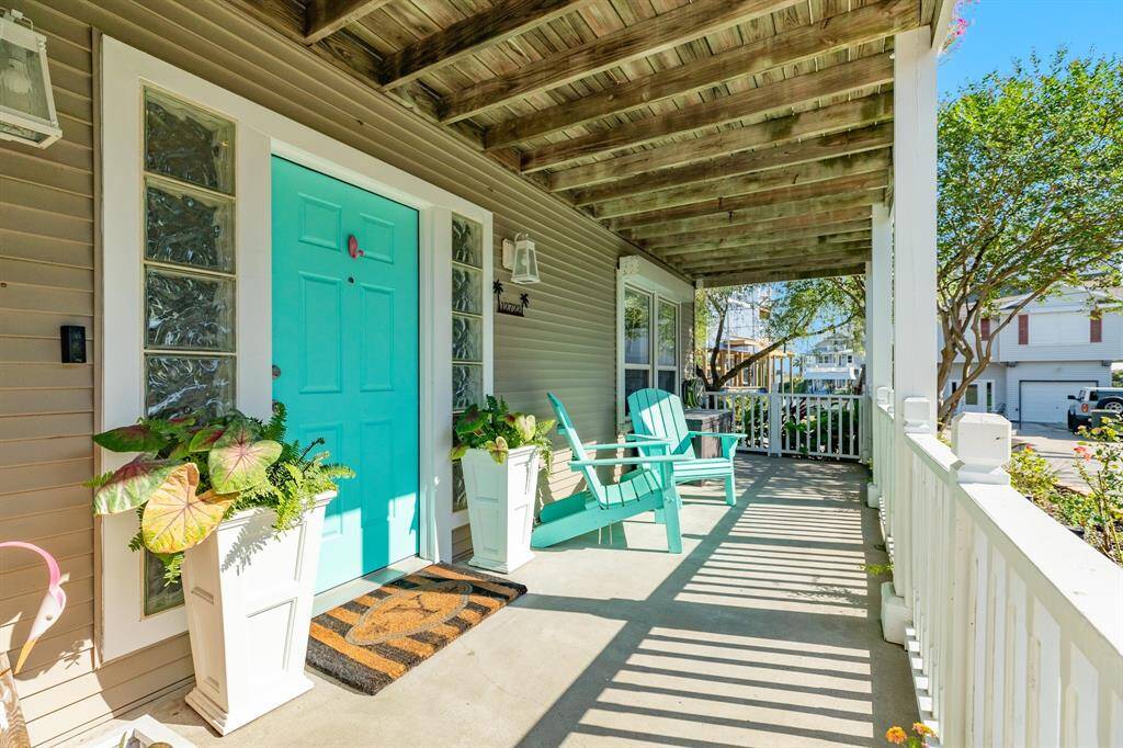 View of the front entrance & ground level front porch.