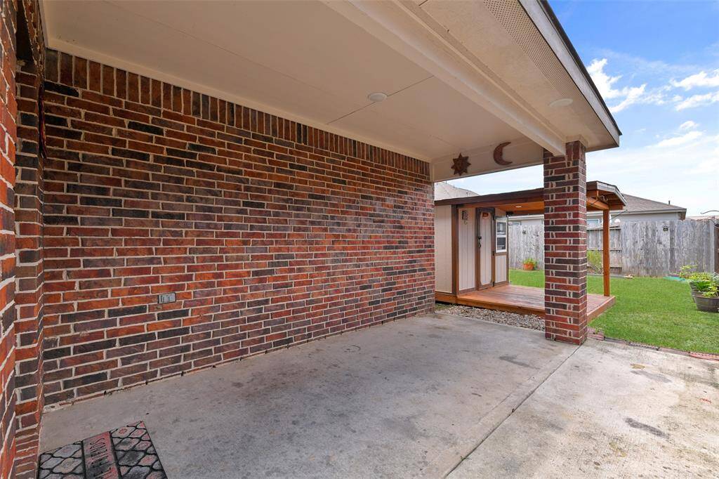 Step outdoors from the family room onto this 8'x16' covered back patio with an extended concrete pad that wraps around to the side of the house. Adjoining the patio is an attractive storage shed with a porch and a large lush yard with plenty of room to run!