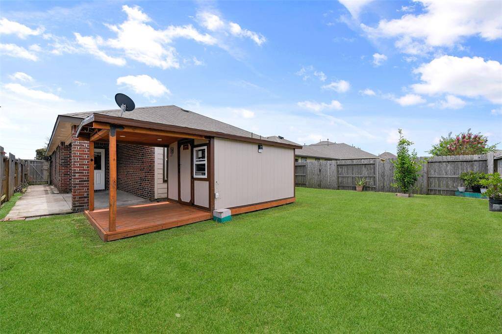 Step outdoors from the family room onto this 8'x16' covered back patio with an extended concrete pad that wraps around to the side of the house. Adjoining the patio is an attractive storage shed with a porch and a large lush yard with plenty of room to run!