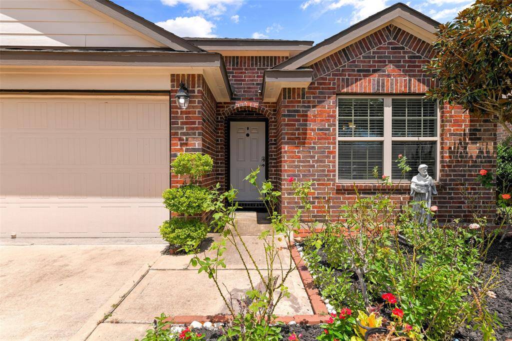 Welcome to 12814 Pirate Bend Drive in the master-planned Lago Mar community in Texas City! This 2017-built DR Horton single-story home boasts great curb appeal with a brick and Hardie Plank elevation with a double-wide driveway and beautifully manicured landscaping.