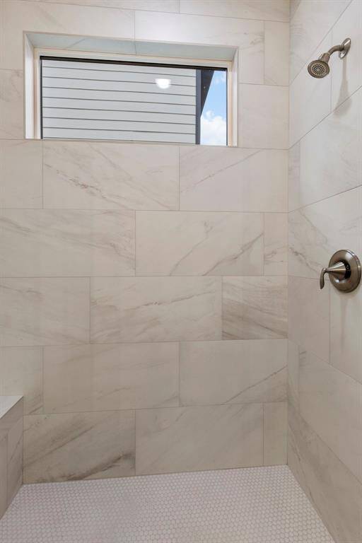 Large primary walk in shower.