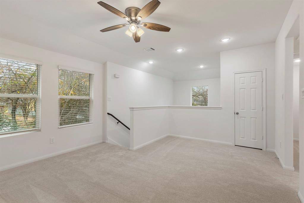 Game room off of two additional bedrooms.