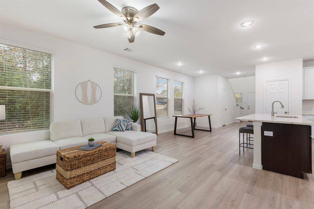 Open floorplan with LVP Flooring throughout the first floor.