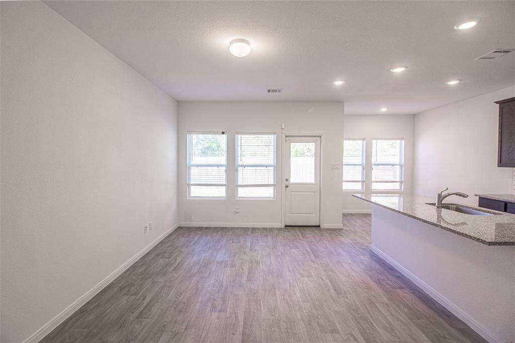 The living room is waiting for you to make it your own!!!