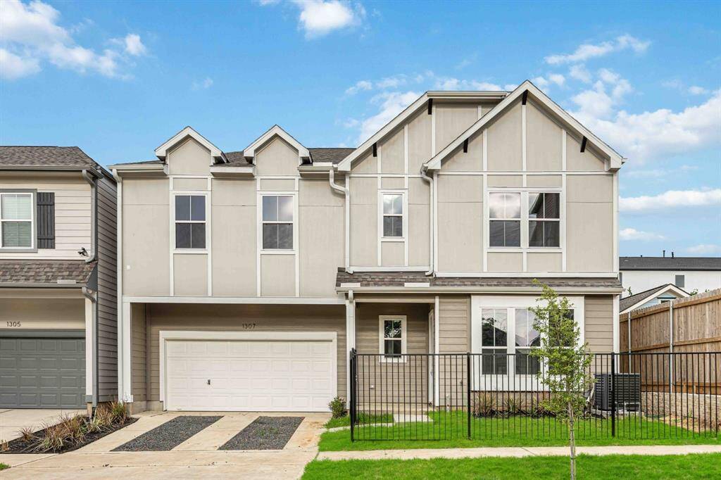 First impressions matter—and this one’s unforgettable. That wide-gabled roofline, charming front porch, and gated front yard create instant curb appeal. Bonus? A private two-car driveway means no circling the block.