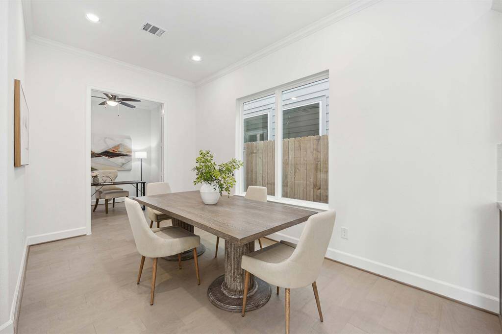 Dinner parties, game nights, or Taco Tuesday—this flexible dining space adapts to whatever your life looks like. And yes, that’s your home office just steps away.