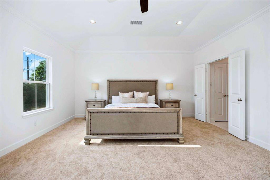 Timeless, tranquil, and totally your vibe. This primary bedroom checks the boxes you didn’t even know you had.