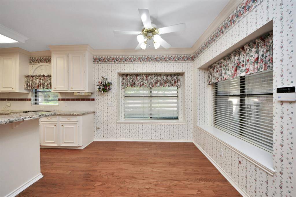 The breakfast room provides place for a table and chairs to eat quick meals.