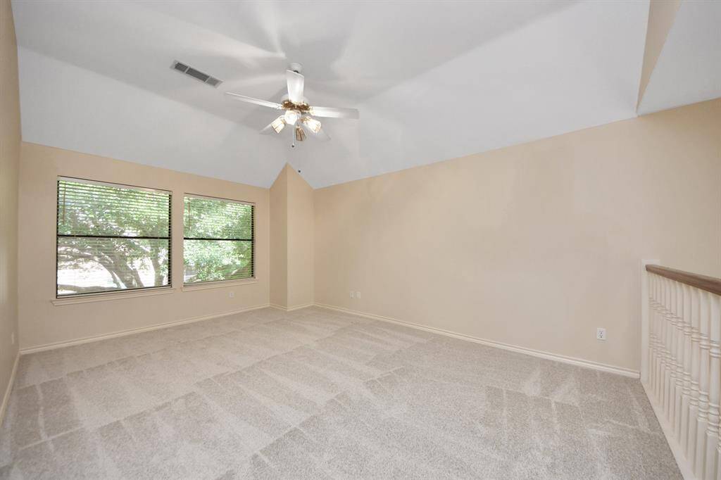 A game room offers a desirable space for toys, media, or a variety of activities, providing flexibility for family fun.