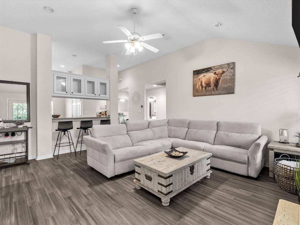 Tall ceilings help maximize the spacious feeling of the living room