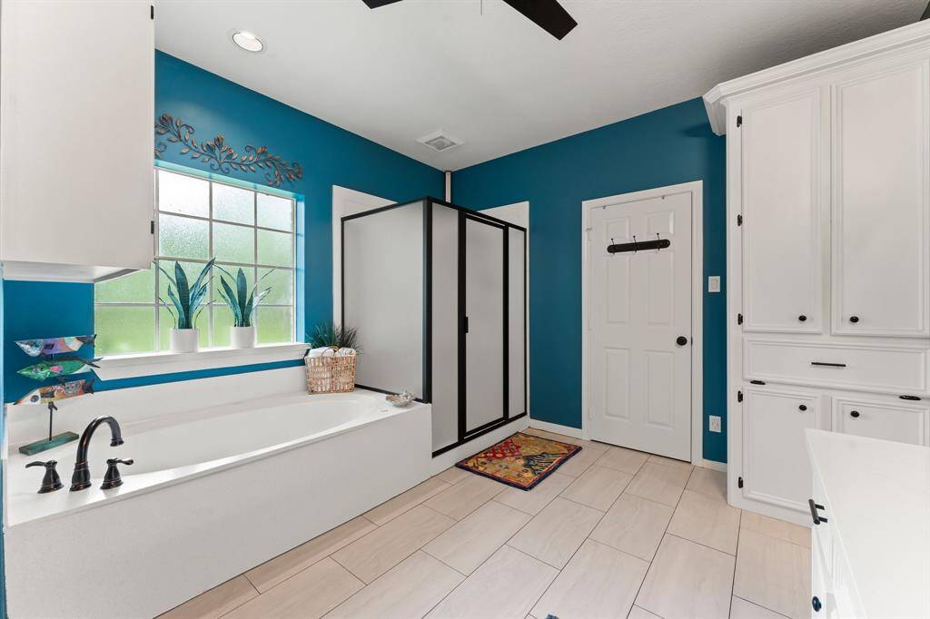 Primary bath. Two separate closets. Soaking tub and separate shower.