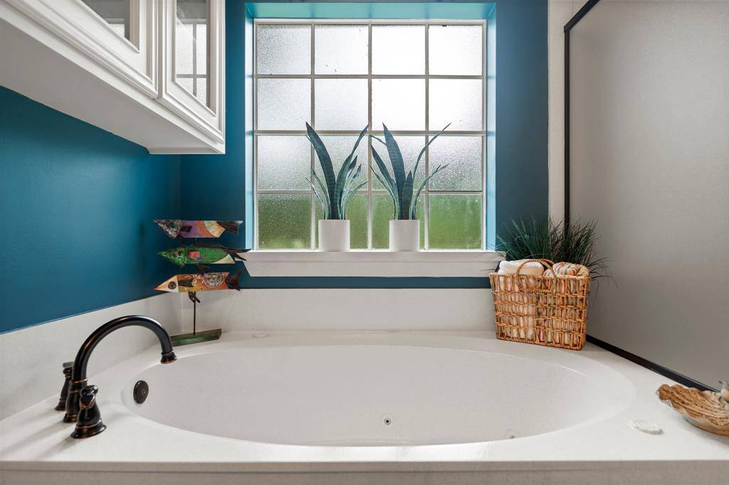 Primary bath. Two separate closets. Soaking tub and separate shower.