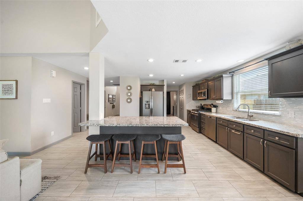 Extra seating makes this an entertainers dream home!