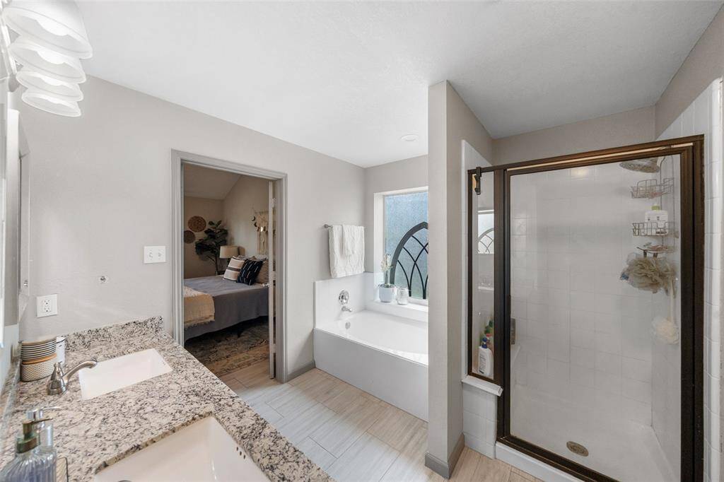 Enjoy this soaker tub and separate shower.