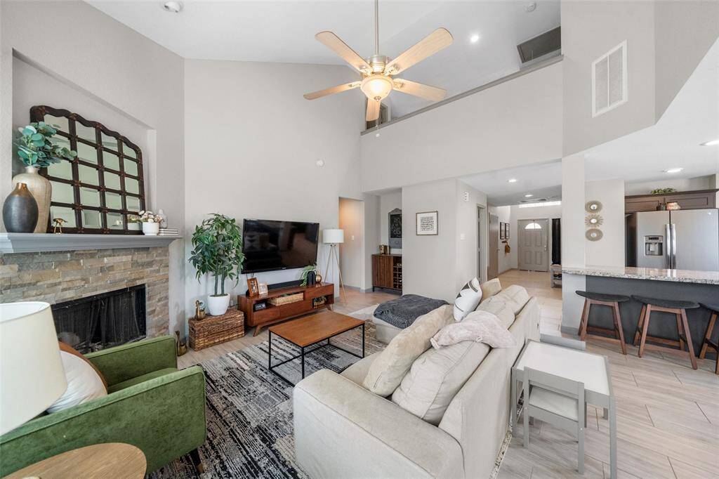 Low maintenance vinyl flooring bring this open concept floorpan together.