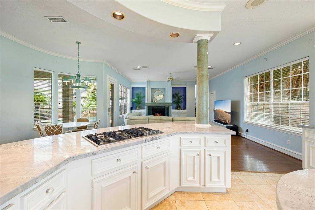 Unique round center island with utility sink and disposal