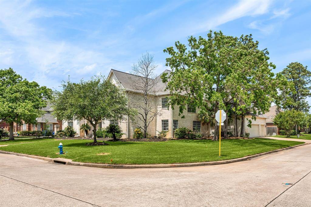 Situated on a corner lot with a large lot size!