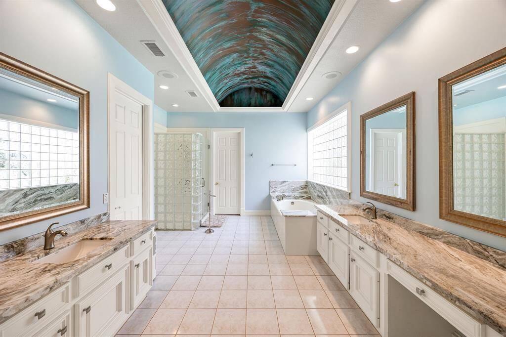 Spacious primary with lots of room for a sitting area.