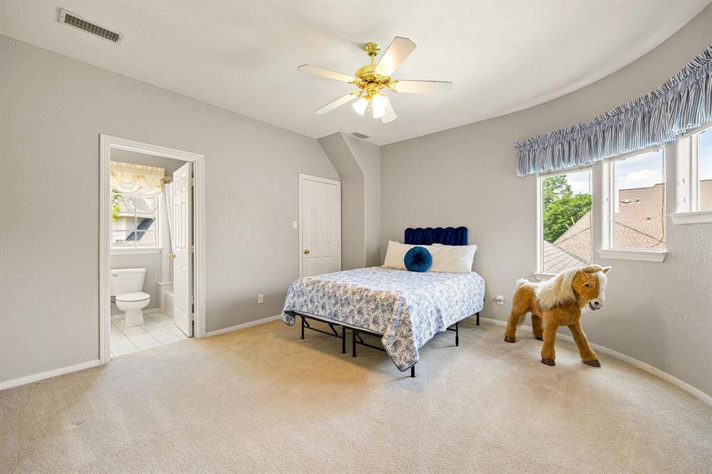 Second bedroom with en-suite bath located upstairs