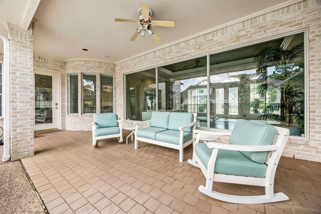 Covered poolside patio wired for sound with speakers installed