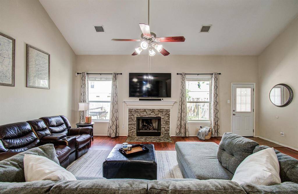 Gathering with family in a lage room with ceiling fan.