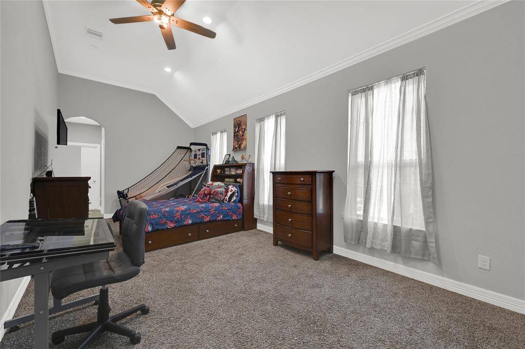 Second primary bedroom with double closets.