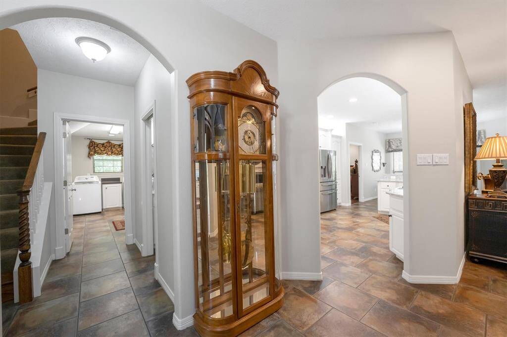 Arched doorways elevate the space