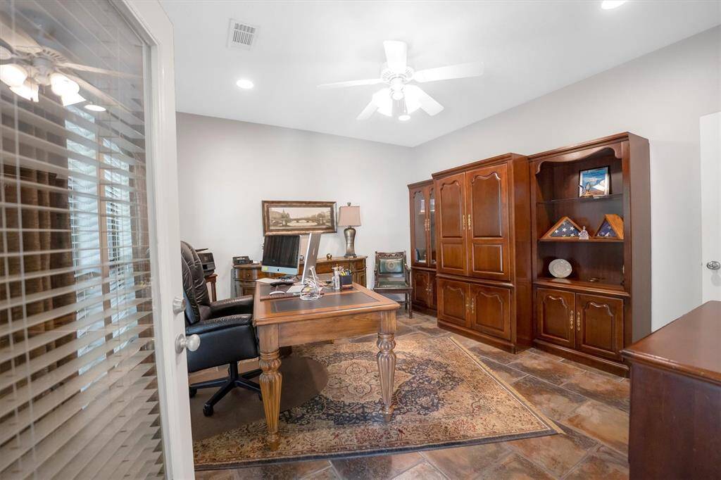 Private study with access to the patio- could serve as a 4th bedroom