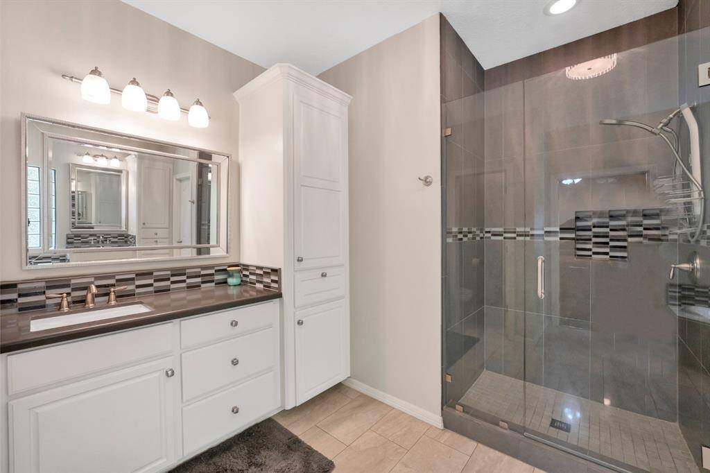 Silestone countertops in both bathrooms