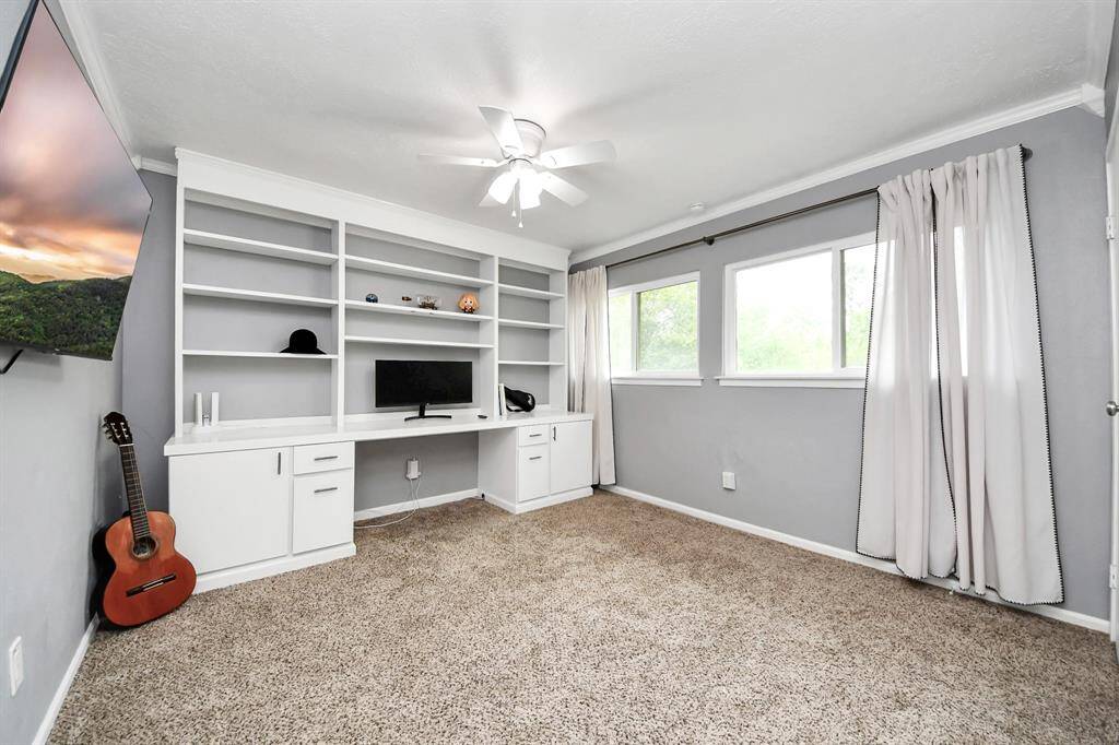 Secondary bedroom with built ins.