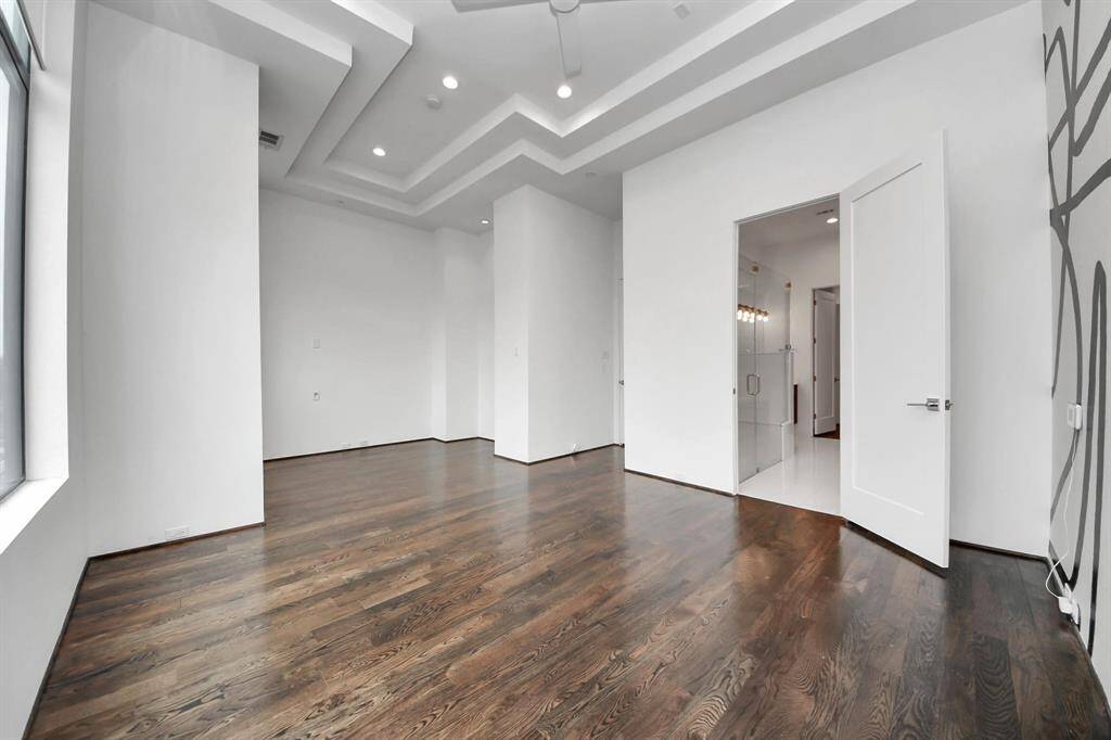 Primary bedroom has all the room for you to add an office or gym area.