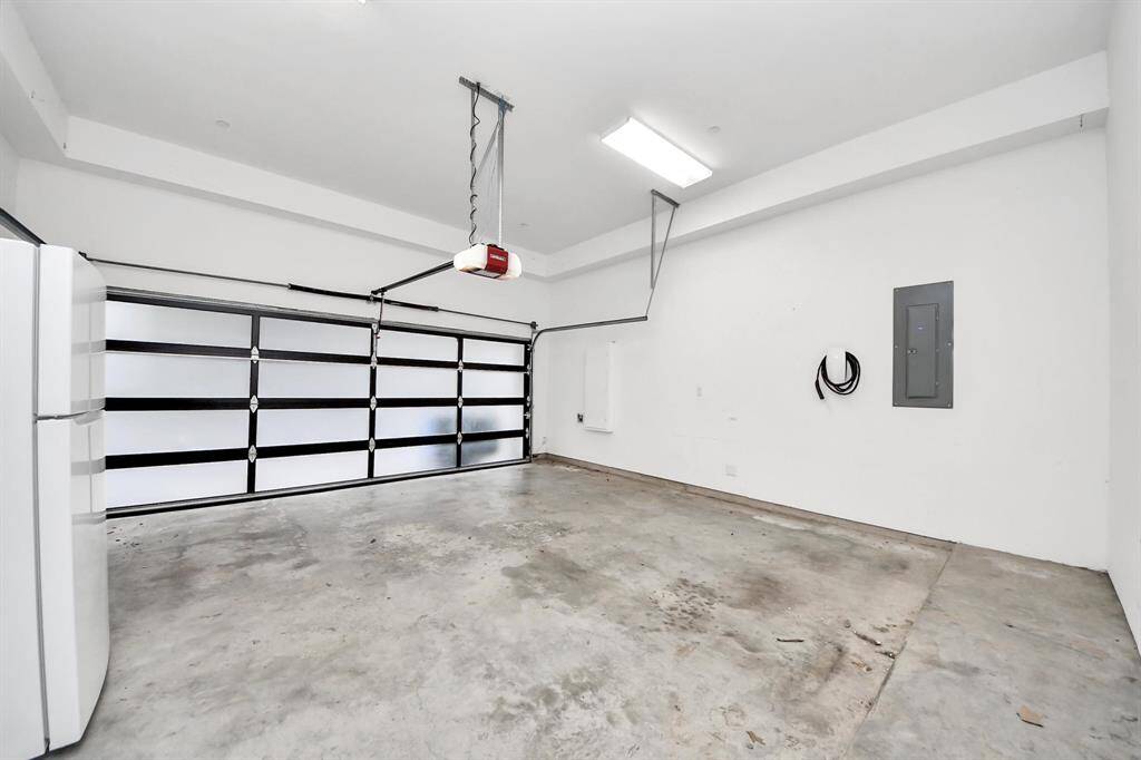 two car garage with EV charger.
