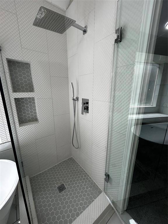Rain shower head! Spa like retreat- frameless shower glass