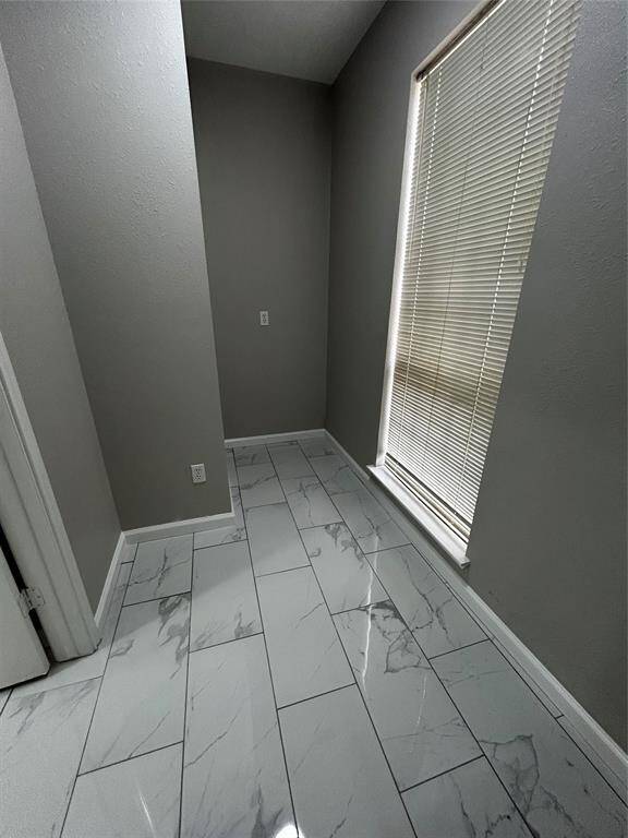 Laundry room, plenty of space for another fridge or freezer