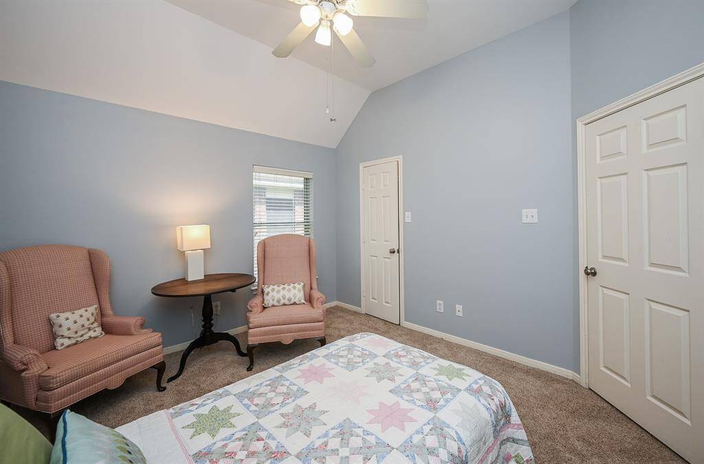 This bedroom includes ample closet space and flexible layout options for various furniture arrangements.