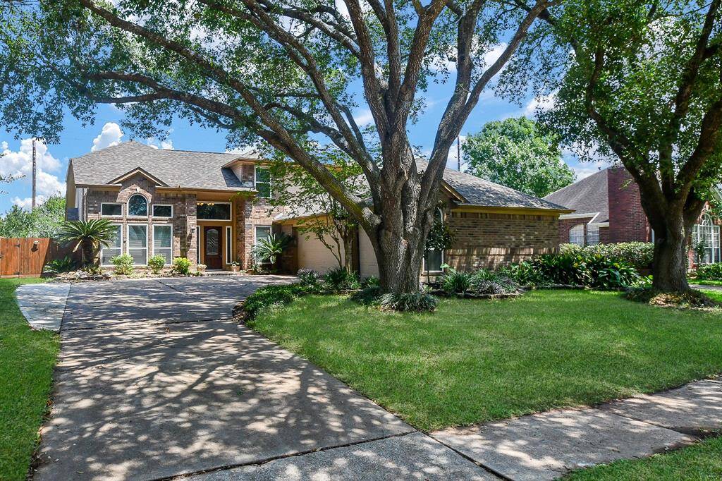 Discover your dream home at 1602 Pecan Crossing, featuring a well designed 2 Story Home in a serene, tree-lined setting.