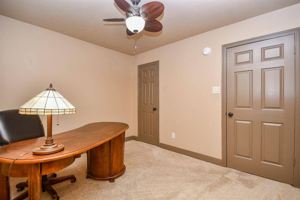 A Cozy bedroom or home office with lots of natural light.