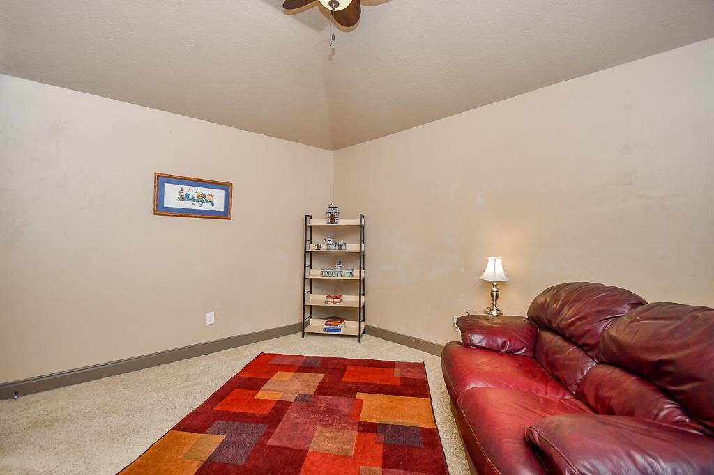 Another comfy bedroom with ample space.