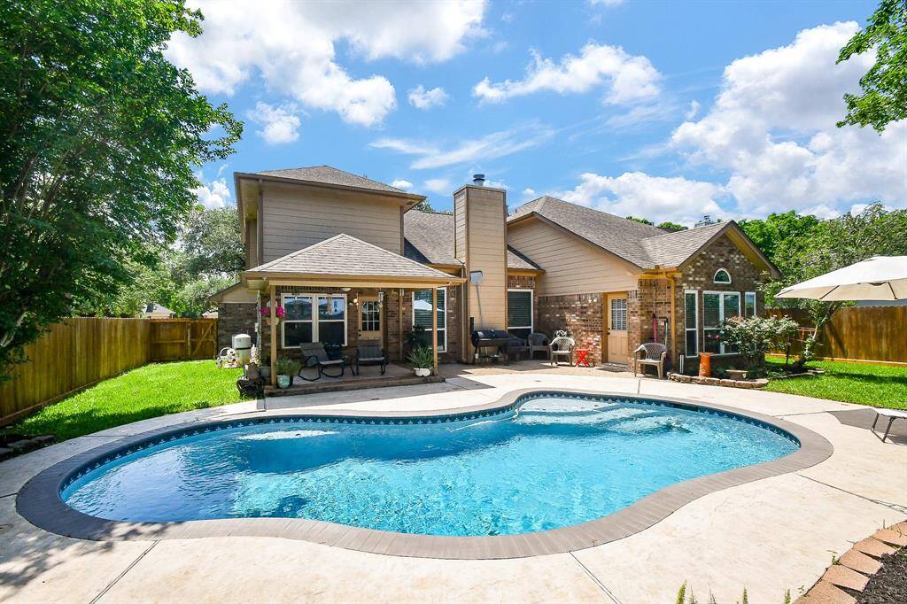 Enjoy ultimate privacy and a spacious yard in this serene retreat.