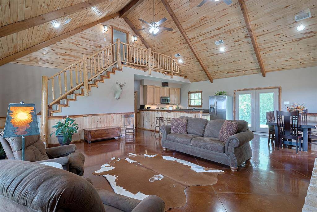 Cathedral ceilings in the entire downstairs common area make this open space feel even more spacious.