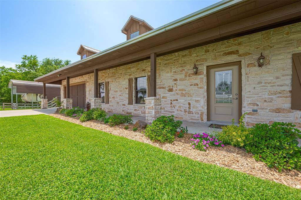 Imagine enjoying your morning coffee from this front porch
