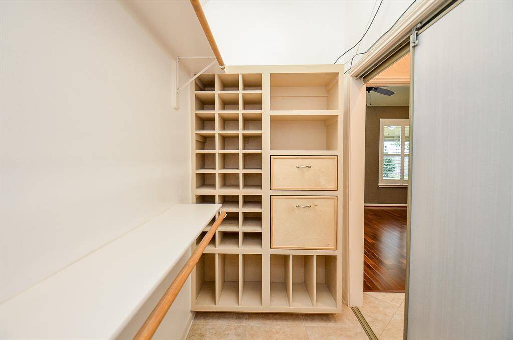 Look at Primary Bath with Custom Cabinetry, Double Sinks and Steam Shower