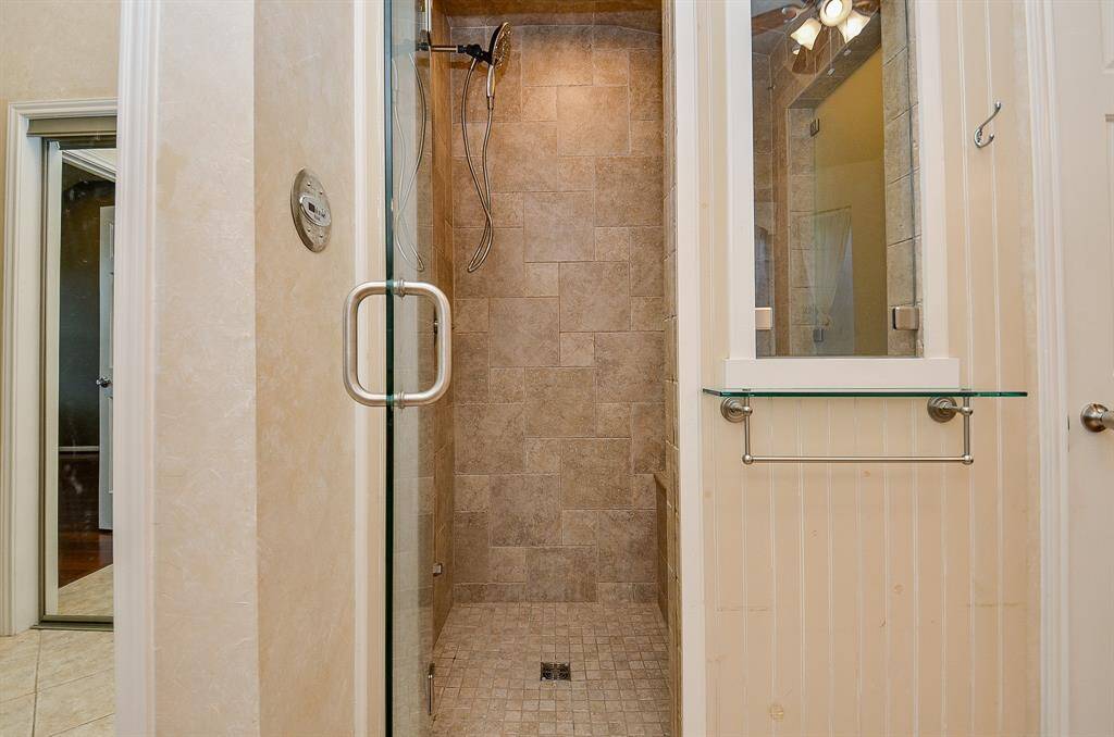 Deep Whirlpool Tub & Steam Room/Shower Combination.