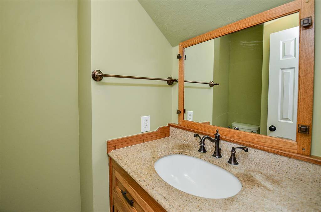 Half Bath Complete with Incredible Custom Cabinetry