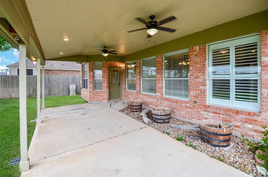 WOW!!! Over-Sized Covered Patio with 2 Ceiling Fans!