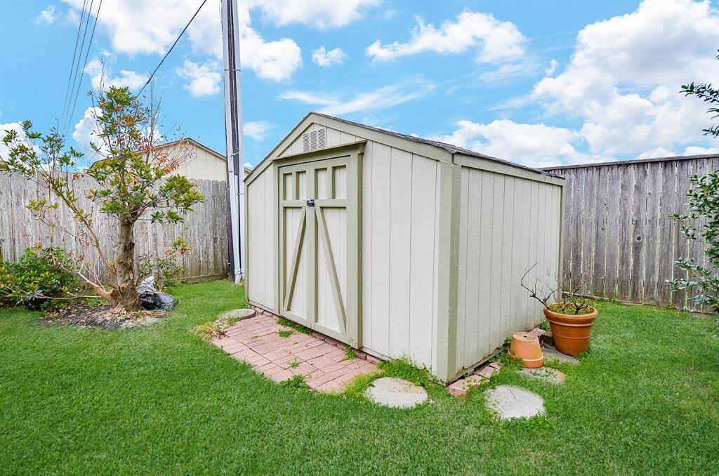 Adorable Storage Shed for Tools and Toys.