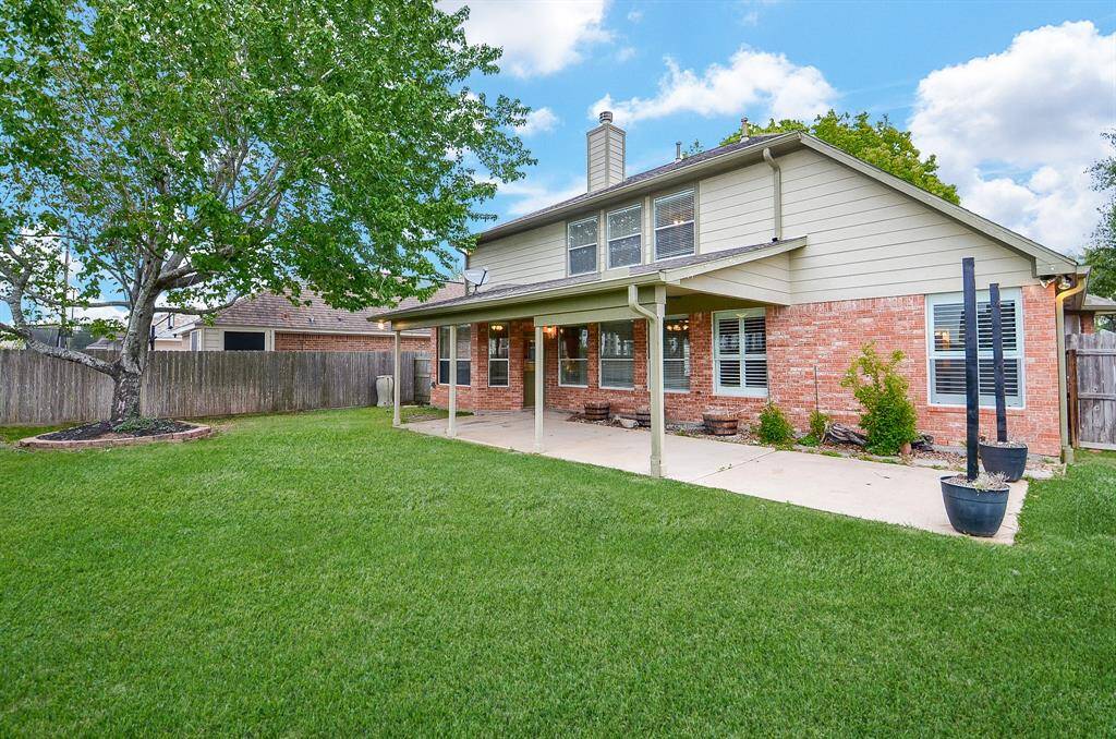 Roof 2013, A/C 2015-16 SEER. Large, Covered Patio w/2 Ceiling Fans & Cute Storage Shed.