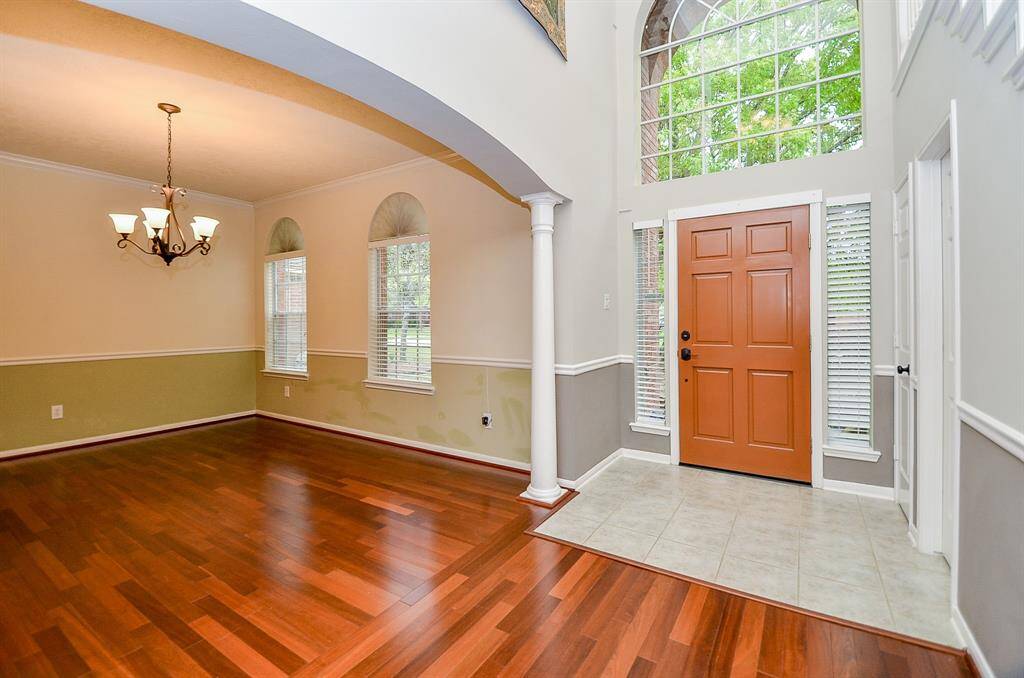 Fabulous Formal Dining Room open to the Light and Bright Entry with Soaring Ceilings!