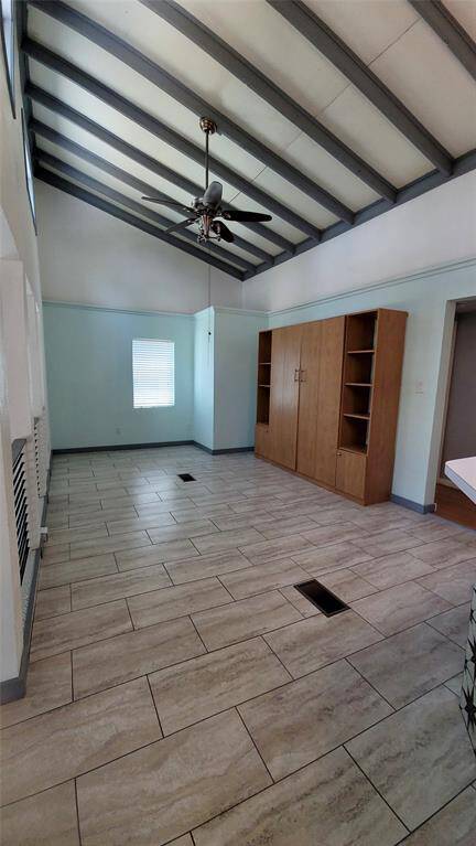 Breakfast bar and dining room, vaulted ceiling and windows